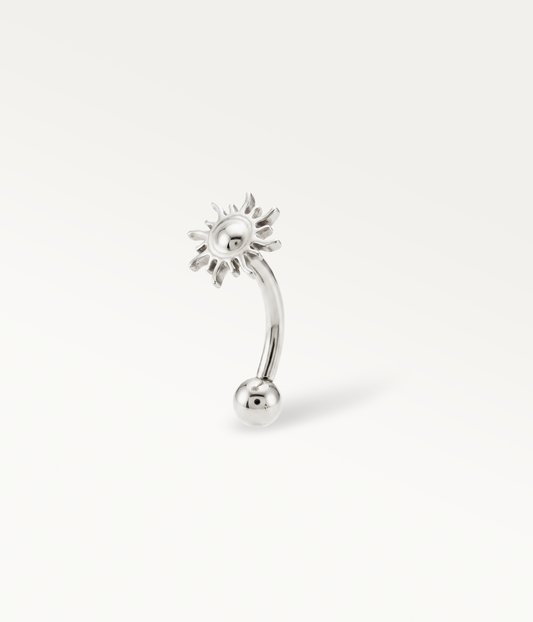 Silver-tone Helios Banane, sun on a curved post with a lower ball, side view.