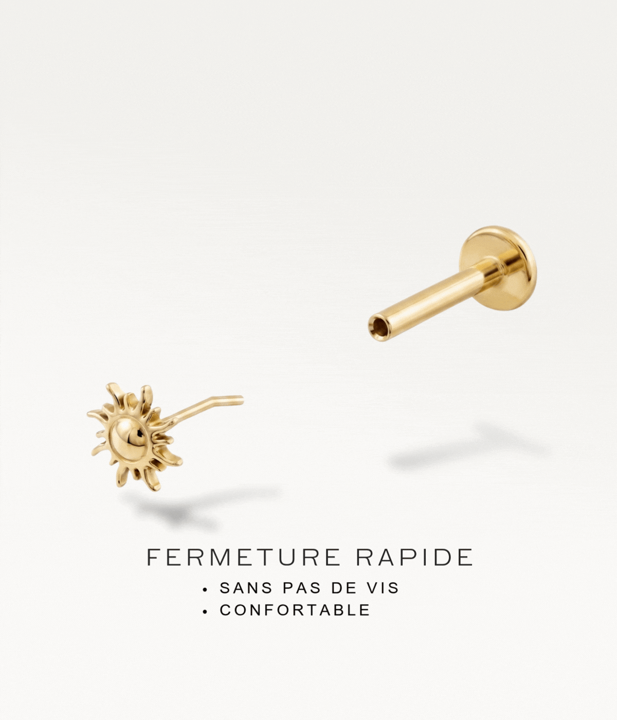 Disassembled gold-tone Helios stud showing the quick threadless fastening.