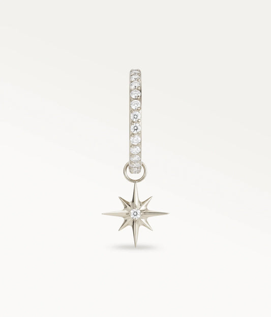 Aro Lueur color plateado con piedras engastadas y colgante de estrella de ocho puntas, vista frontal.