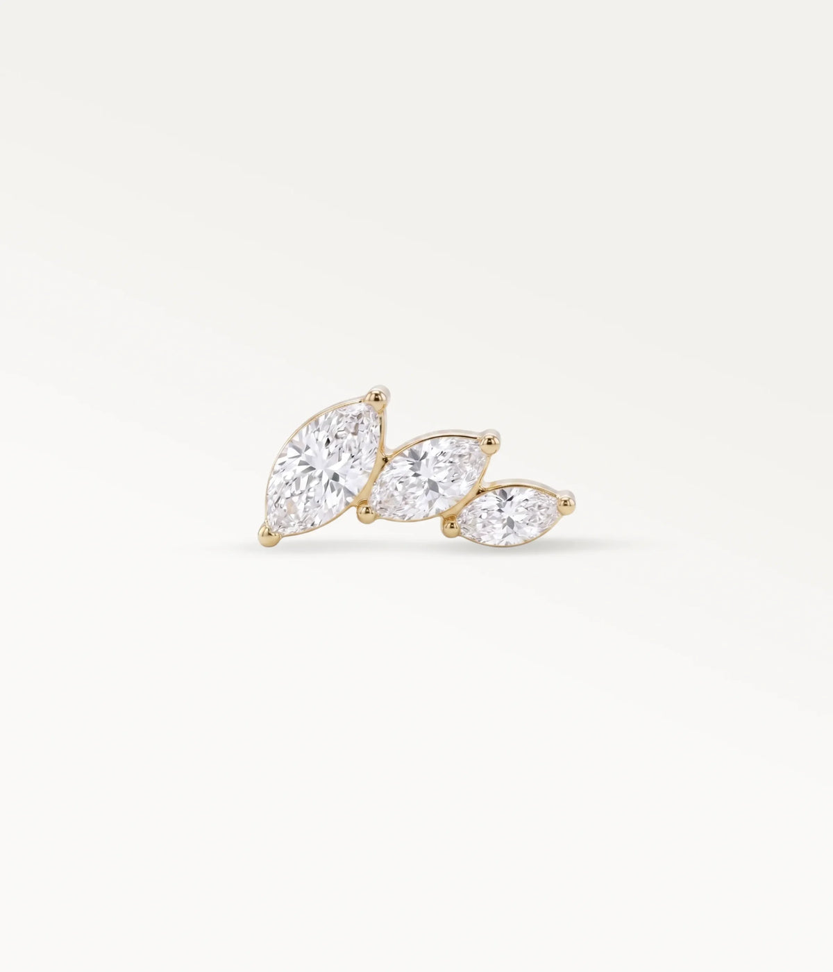 Gold-tone Artémis piercing jewellery adorned with three marquise-shaped stones, bright front view
