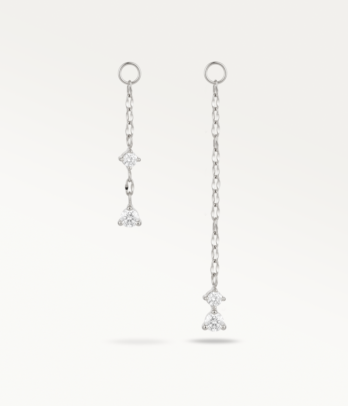 Petite et Grande Stella argentées, deux chaînes de longueurs différentes avec pendentifs à pierres.