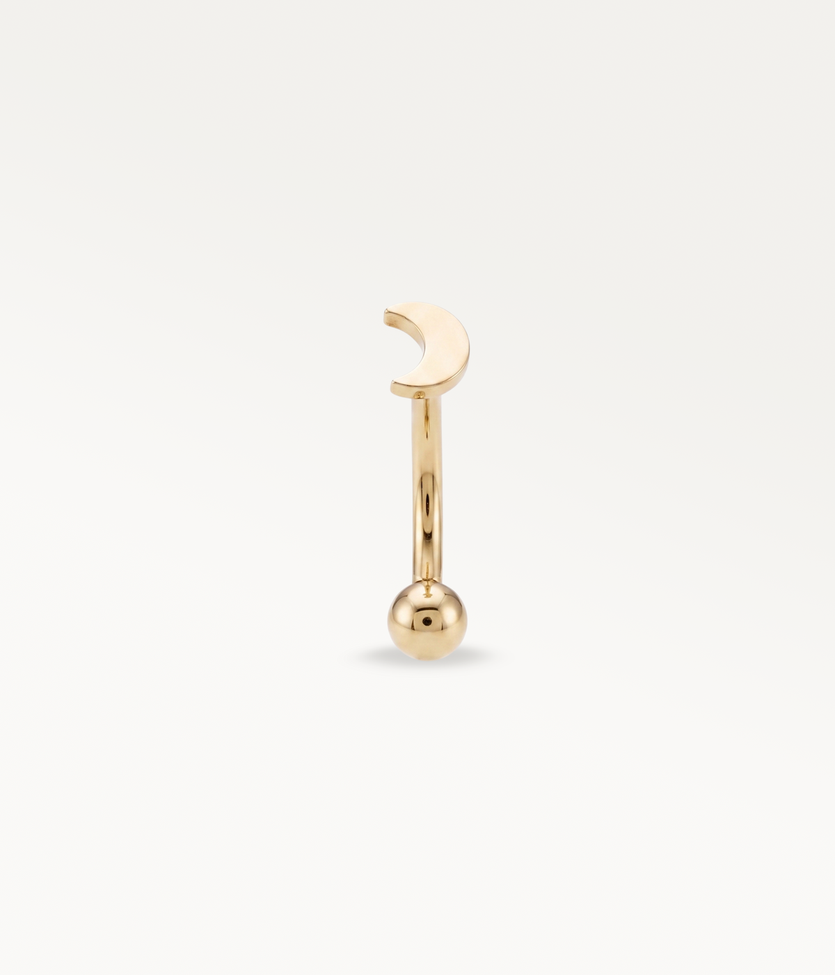 Gold-tone Elara Banane, front view of the crescent moon and lower ball.