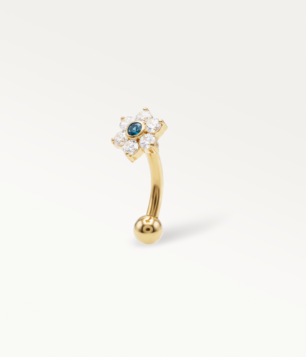 Jolane Bleu, gebogener Barbell, goldfarben, Blume mit blauem Mittelstein an gebogenem Stab, Seitenansicht.