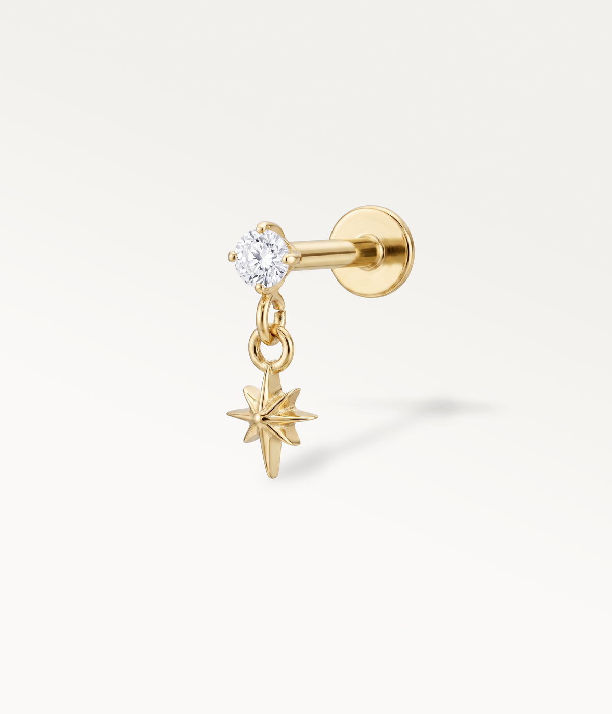 Goldfarbener Ohrstecker Solane mit rundem Stein und hängendem Stern, Seitenansicht mit Stab und flacher Rückseite.
