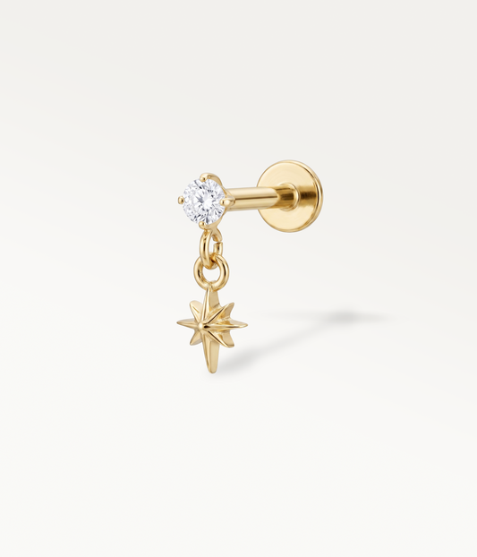 Puce Solane dorée à pierre ronde et étoile pendante, vue de côté avec tige à dos plat.