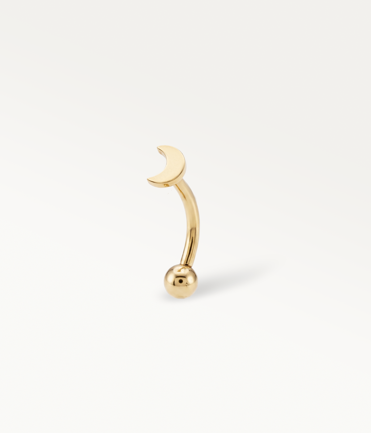 Gold-tone Elara Banane, smooth crescent moon on a curved post, three-quarter view.