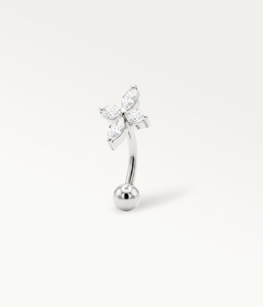 Silver-tone Aster Banane with a four-stone design and curved post, side view.
