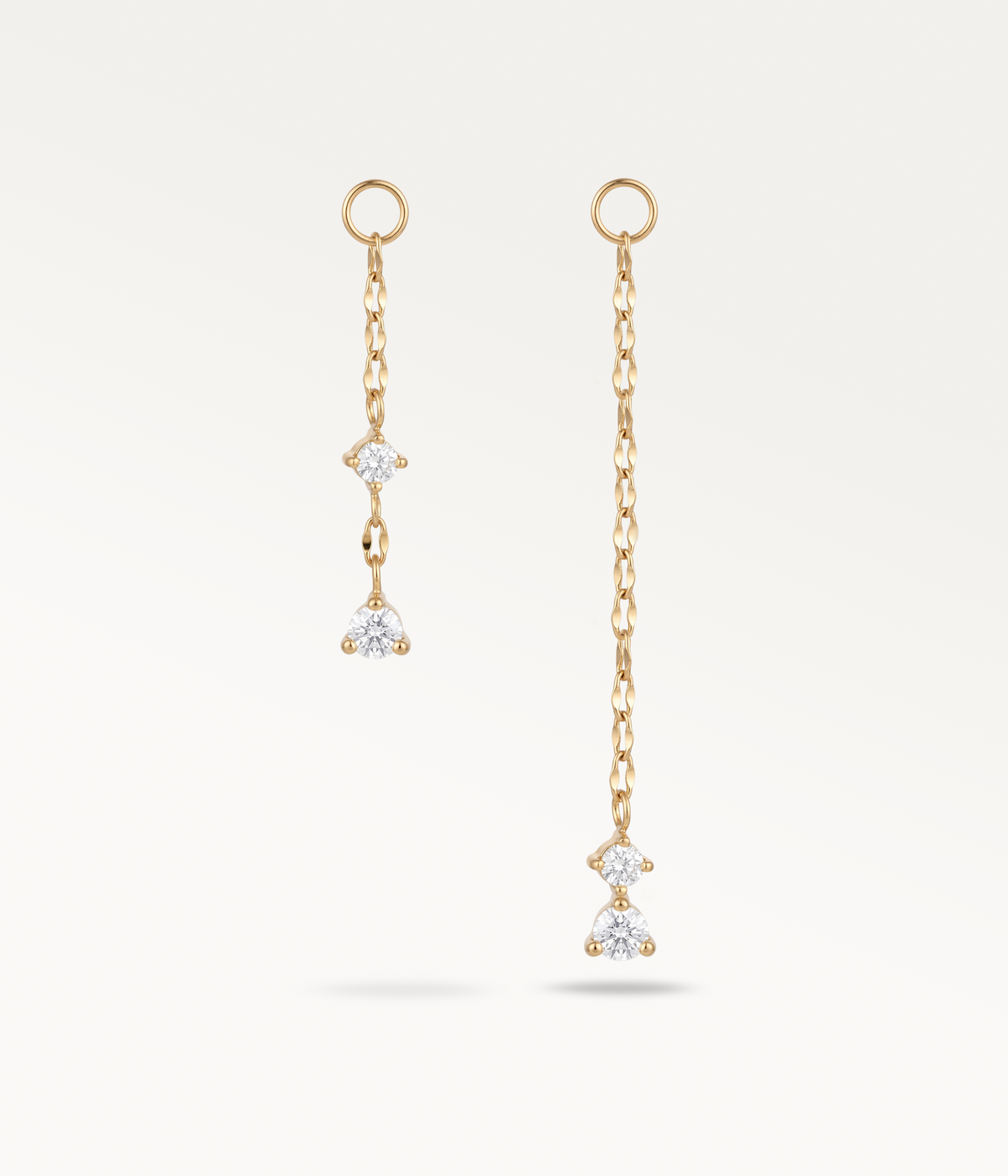 Petite et Grande Stella dorées, deux chaînes de longueurs différentes avec pendentifs à pierres.