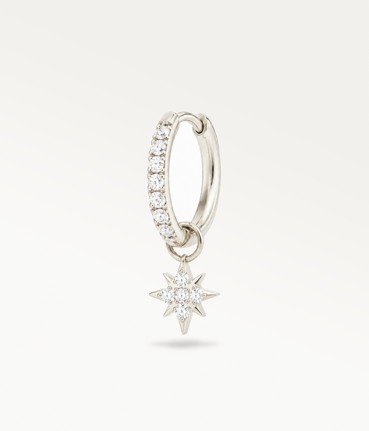 Silver-tone Astre hoop earring set with stones and a star pendant, three-quarter view.