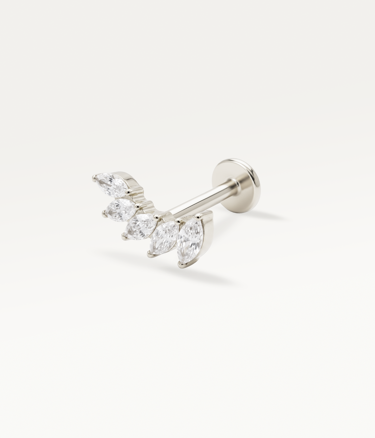 White-gold-coloured or silver-tone envolée lobe jewellery set with rhinestones