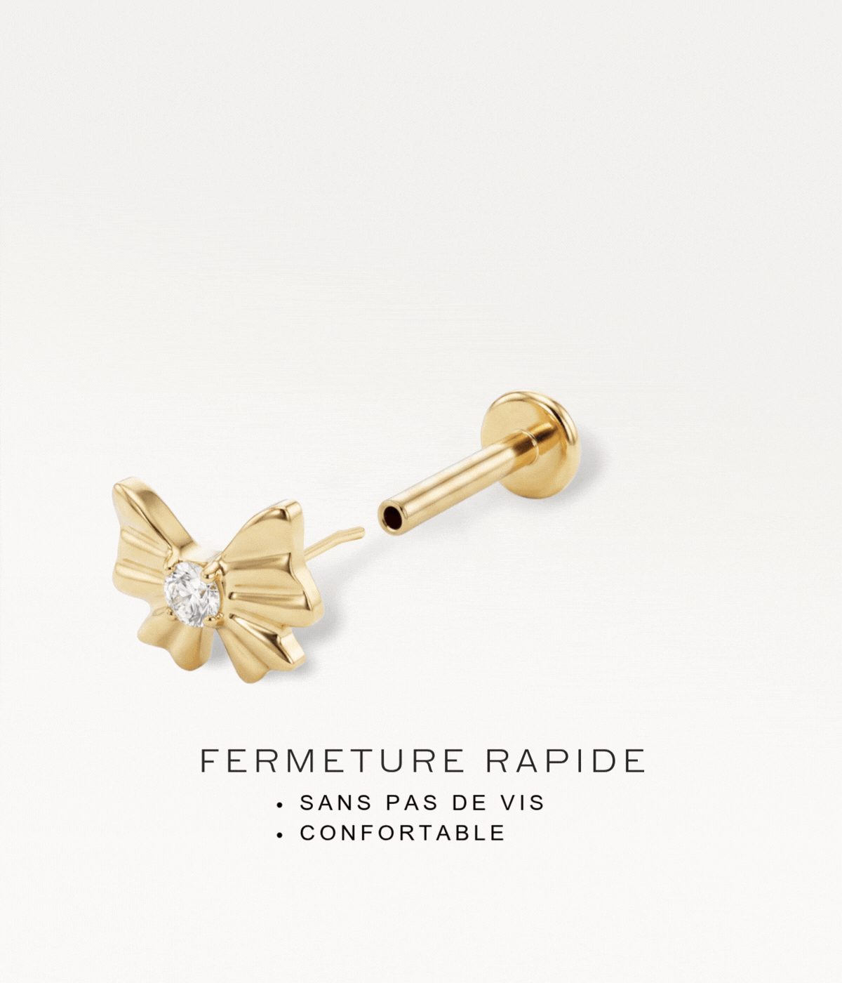 Gold-tone Noeud d’Or, disassembled to illustrate the quick threadless fastening.