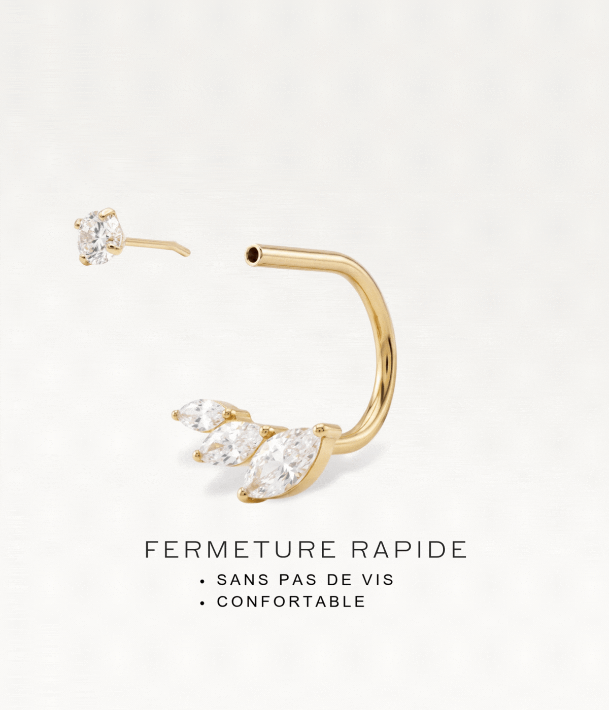 Disassembled gold-tone Eclat earring showing the quick threadless fastening.