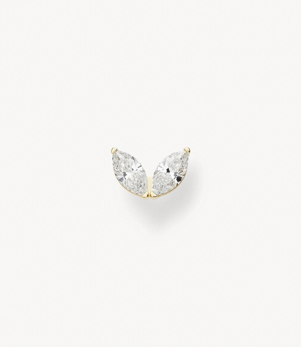 Gold-tone titanium piercing jewellery with a two-petal motif set with sparkling zircons