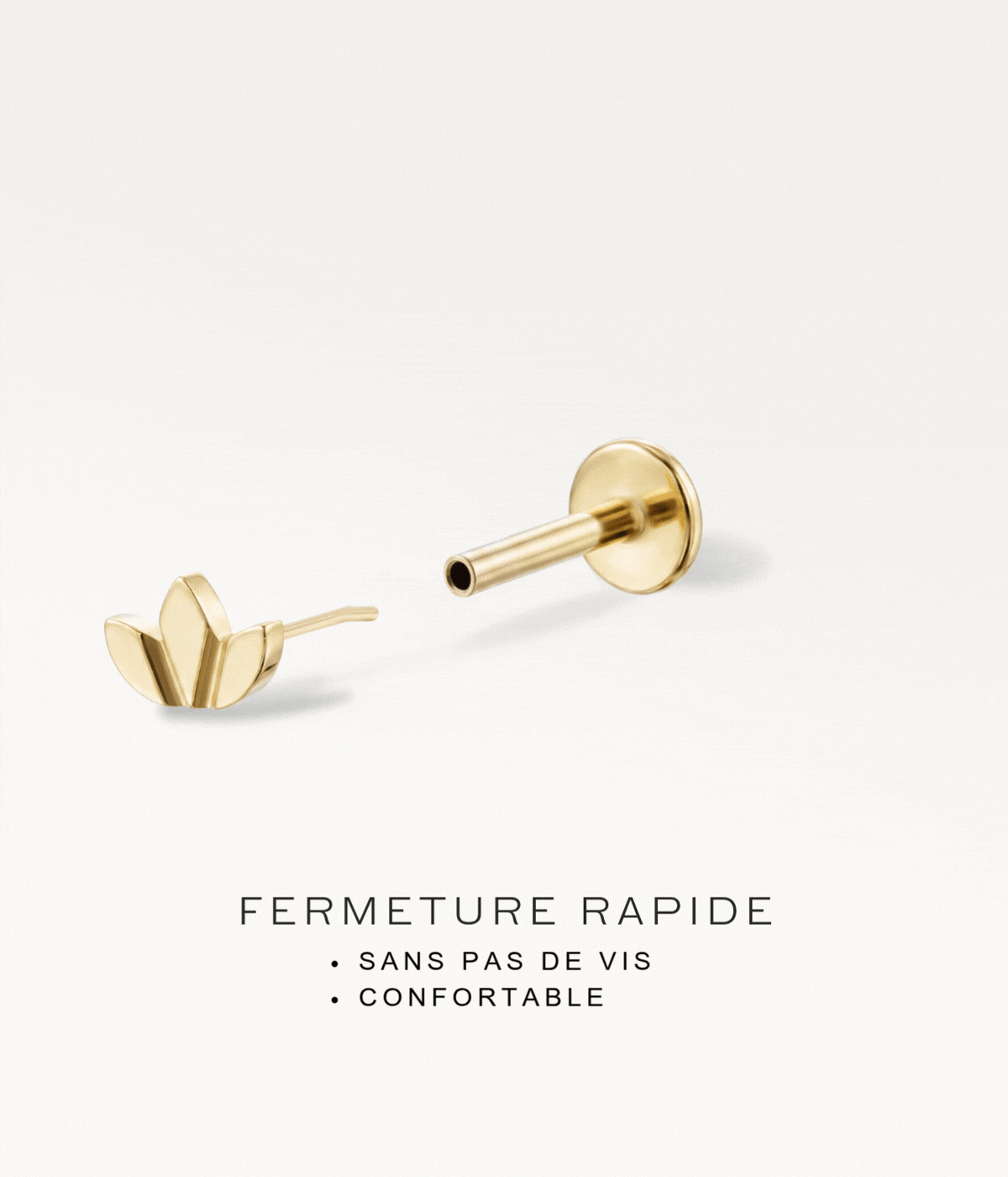 Gold-tone lotus flower piercing jewellery with a threadless system, demonstrating the fastening without screws