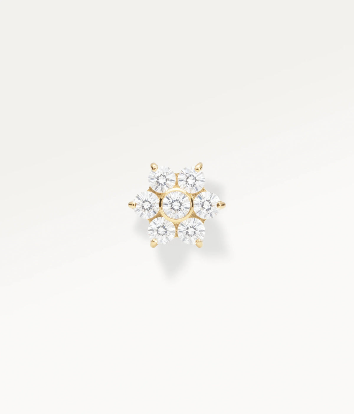 Gold-tone flower piercing jewellery set with sparkling zircons, a refined, timeless piece