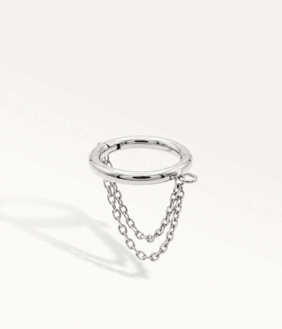 Gold-tone helix jewellery adorned with two delicate chains connected to the silver-tone hoop