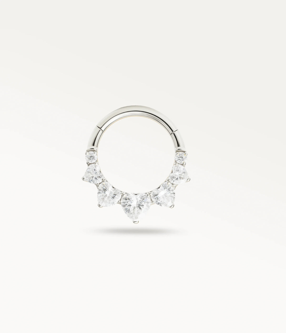 Silver-tone Cyrielle hoop adorned with a fan of stones on its lower half.
