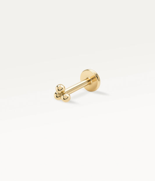 Stud Annouk doré à trois petites billes et dos plat, vue de côté.