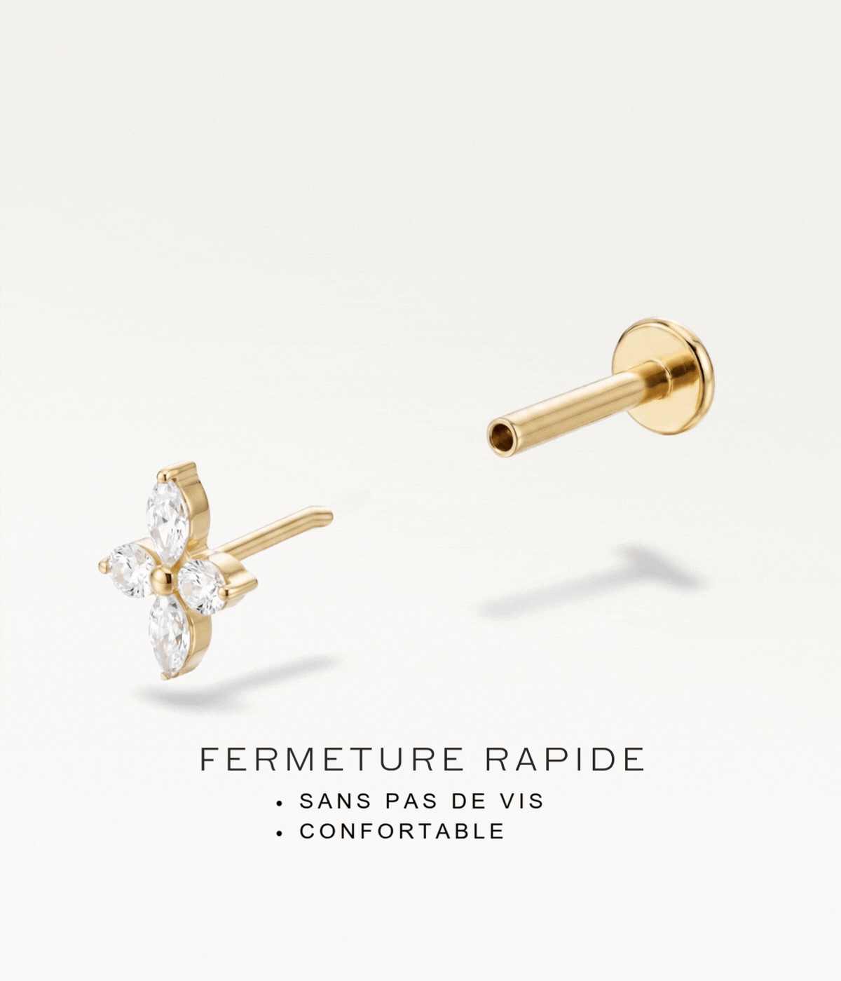 Gold-tone flower stud with a threadless fastening, demonstrating the mechanism without screws
