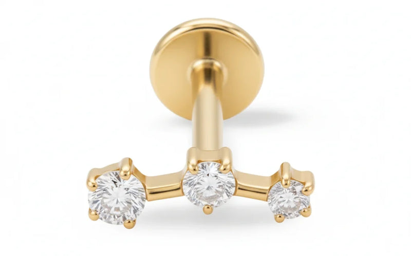 Piercing Evergold doré à trois zircons brillants, finition raffinée