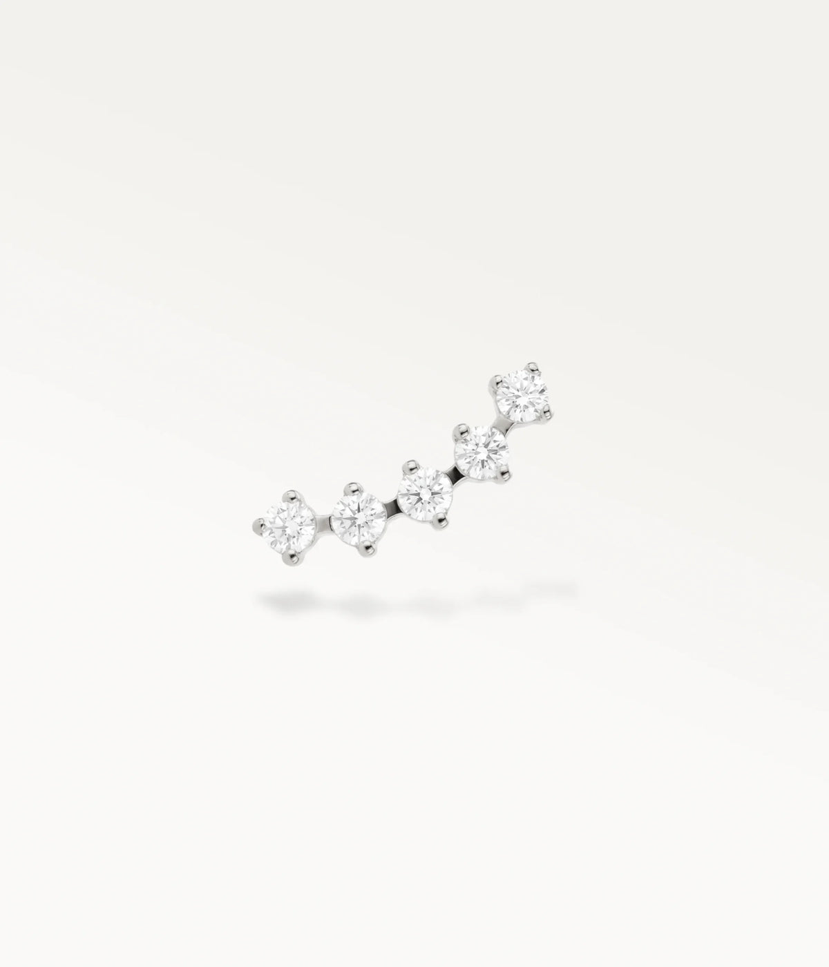 Front view of silver-tone Sillage piercing jewellery adorned with 5 sparkling zircons, a chic piece of helix jewellery