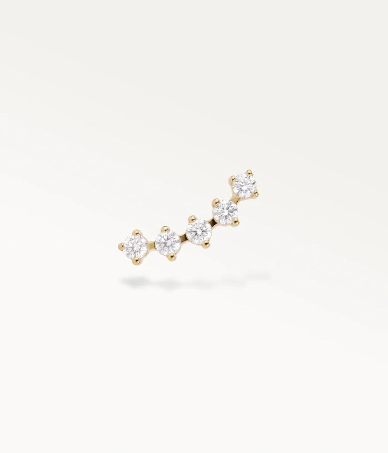 Front view of the gold-tone Sillage helix jewellery, showing the row of 5 sparkling stones against a white background