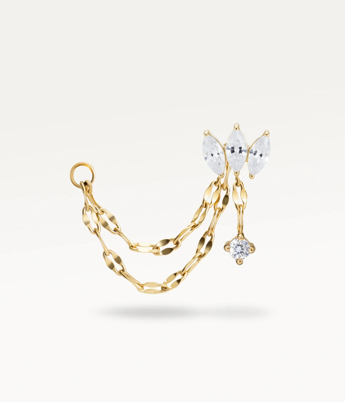 Loé color oro, tre pietre marquise con una pietra pendente e due catene a maglie piatte.