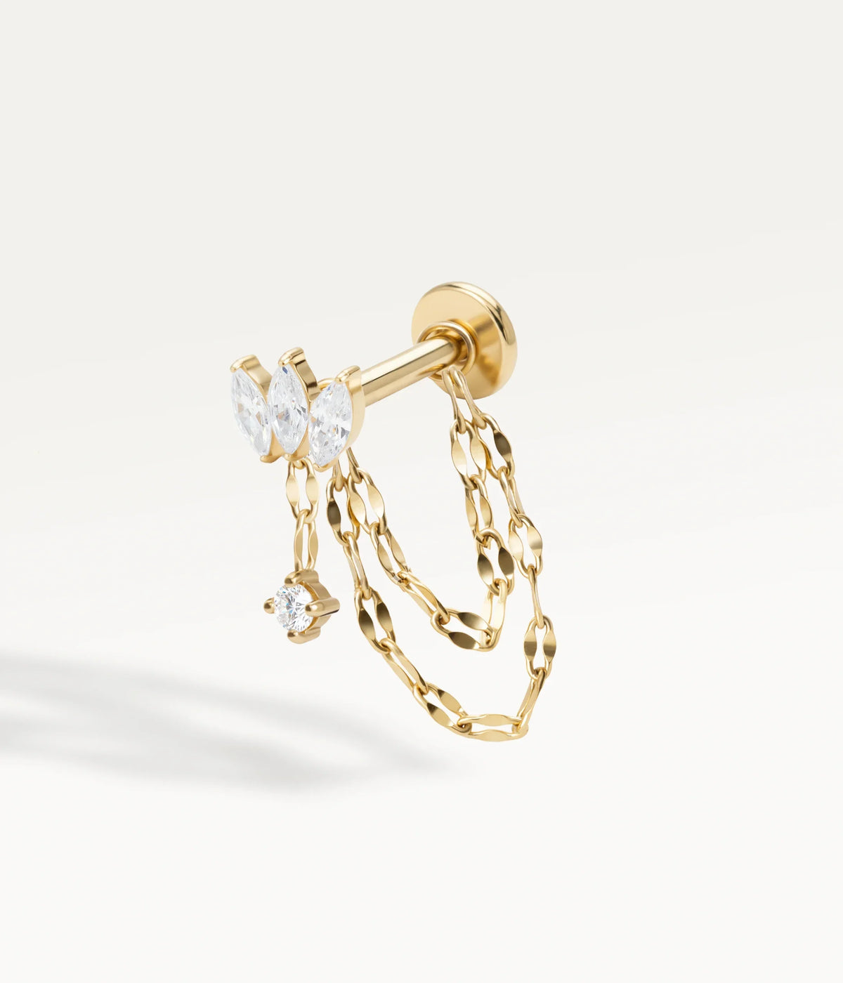 Orecchino a perno Loé color oro con pietre marquise, pendente e doppia catena, vista laterale.