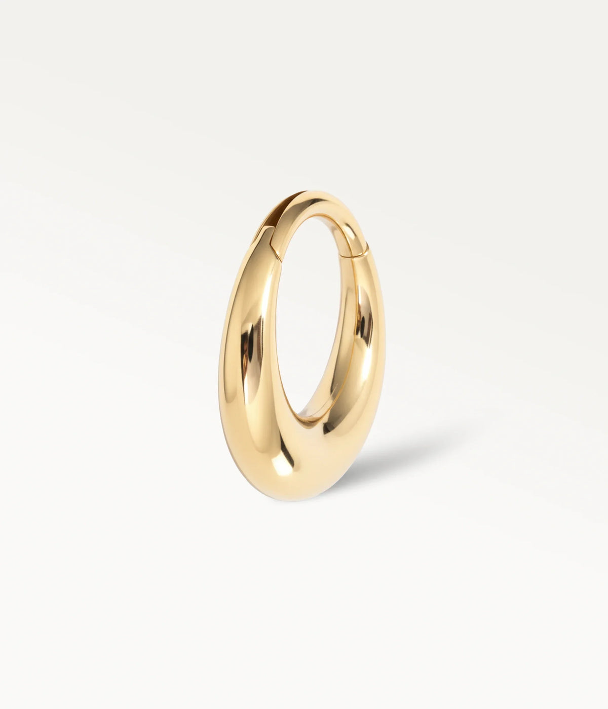 Smooth gold-tone Halo hoop, side view.