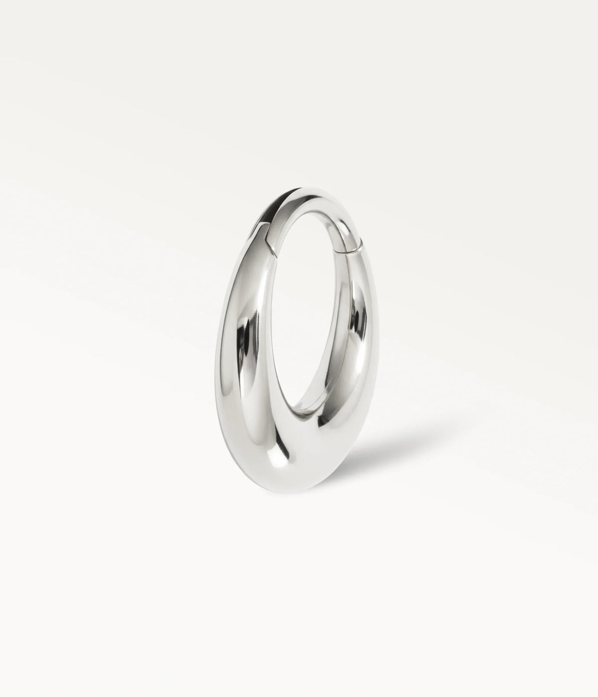 Smooth silver-tone Halo hoop, side view.