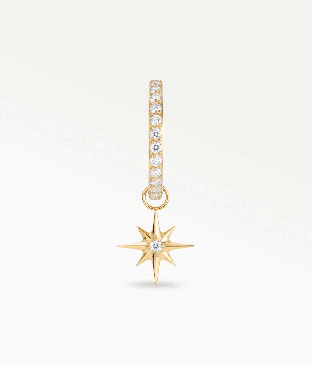 Aro Lueur color dorado con piedras engastadas y colgante de estrella de ocho puntas, vista frontal.