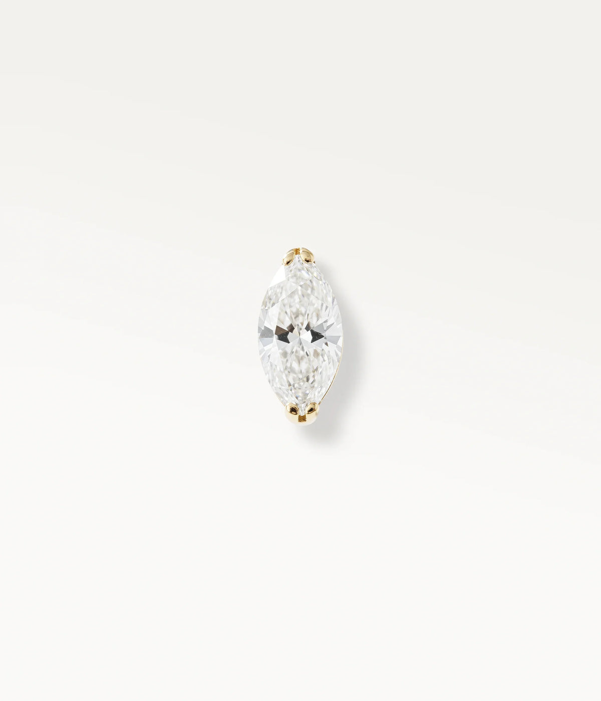 Gold-tone Marquise, front view of the elongated stone in a claw setting.